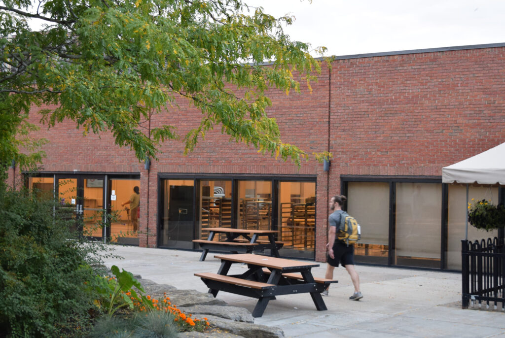 Photo of student walking into Algonquin campus cafeteria